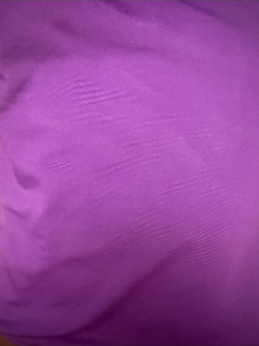 Purple compression bed sheet. Second picture is to show what the sheet is like.